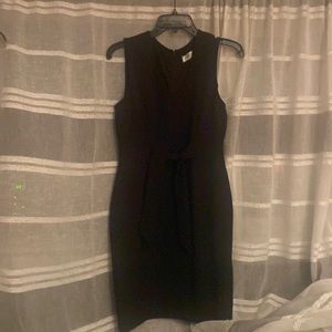 Kasper. Size 6 formal black dress, lined. Tie front. Dry cleaned